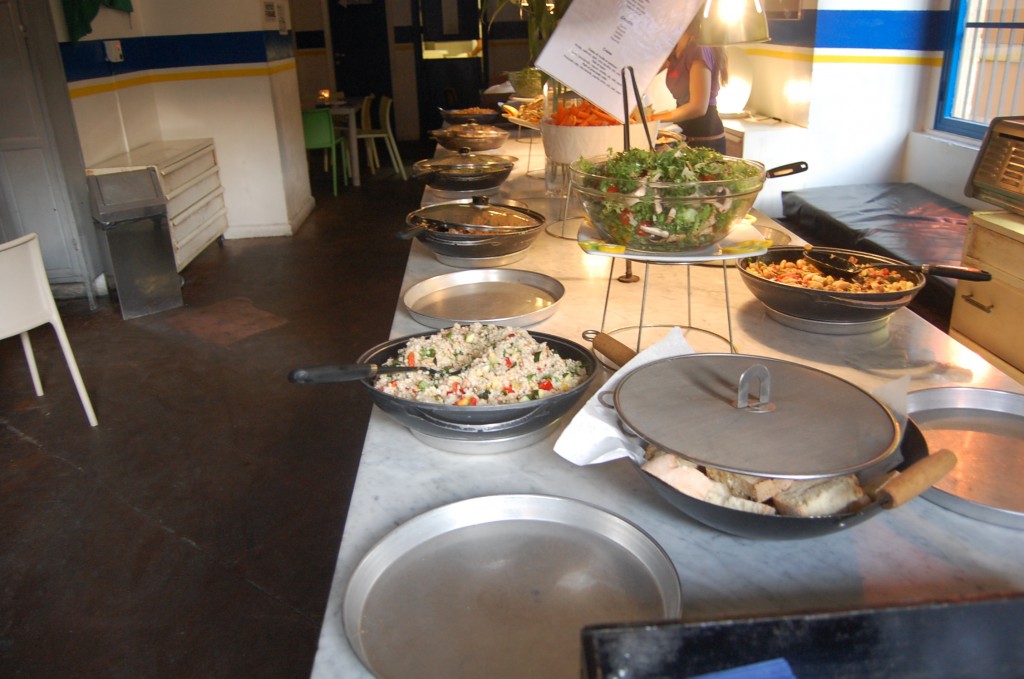 cous cous and salad on a buffet table for the Freni e Frizioni aperitivo