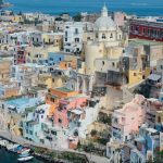 view of colorful houses in corricella procida a top place to stay on the island