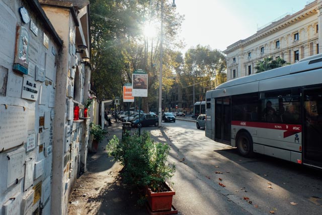 Bus driving down the street in Rome