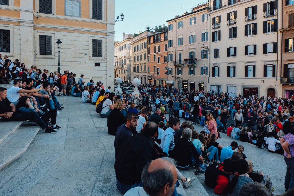people sitting on the spanish steps