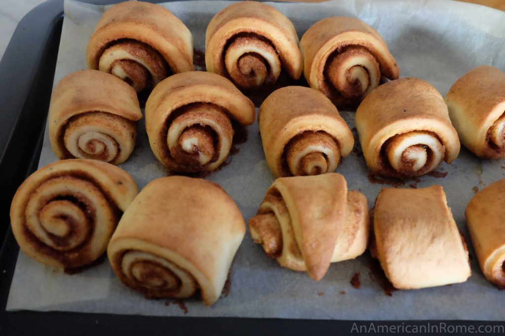 Cinnamon rolls on cooking sheet