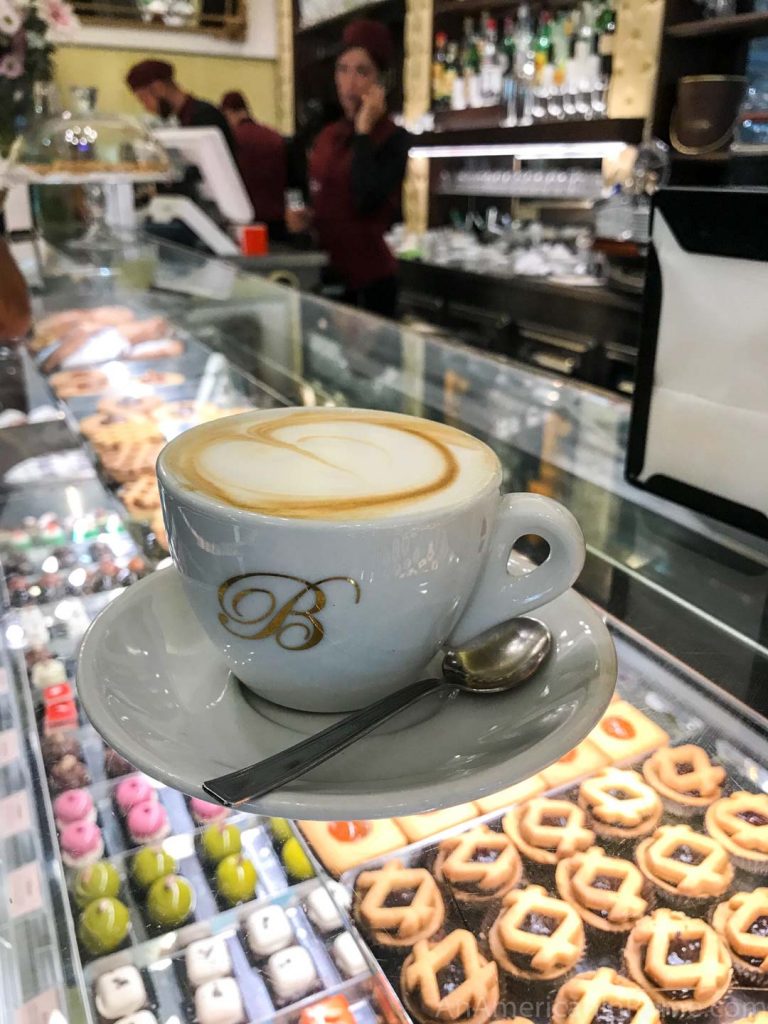 Coffee on the counter above pastries at Pasticceria Barberini