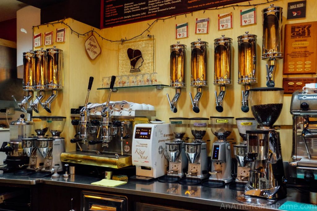 Coffee beans of different roasts and a neapolitan machine at Caffe del Doge in Venice