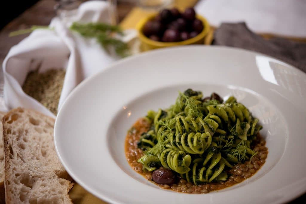 Green fusilli pasta with olives at Trattoria Pennestri in Rome