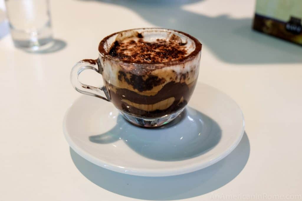 close up of italian marocchino coffee cup in glass with layers of chocolate