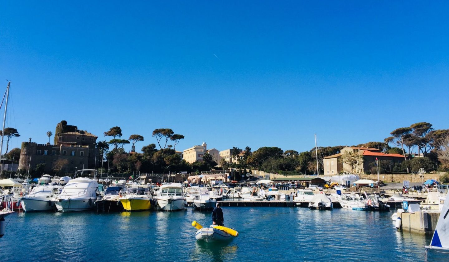 boat in the port at santa marinella