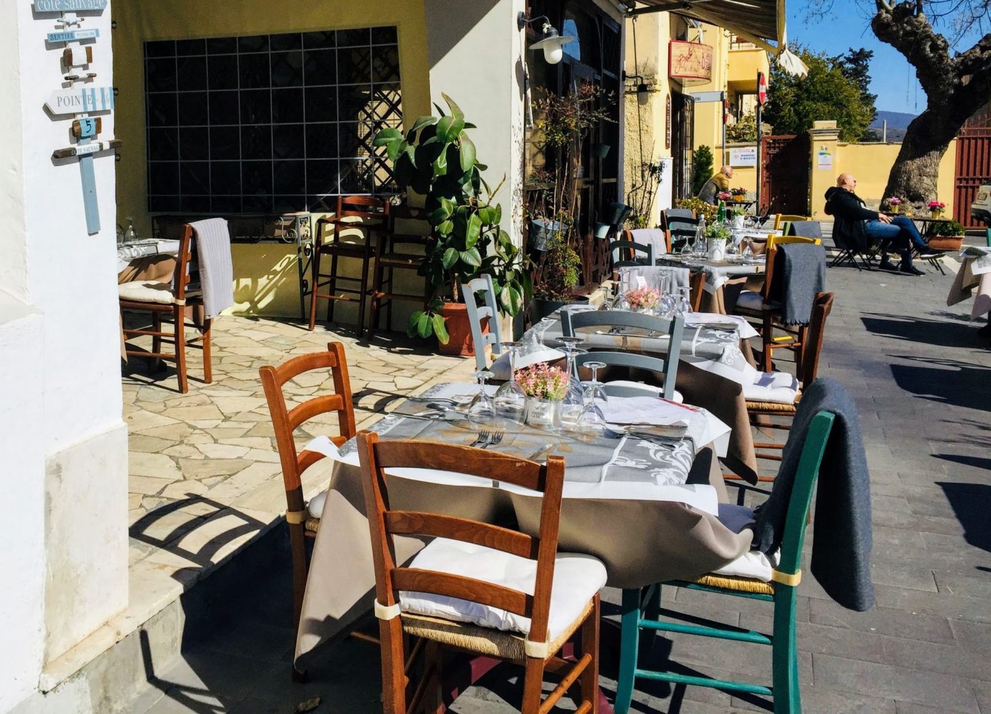 table and chairs outside Italian restaurant