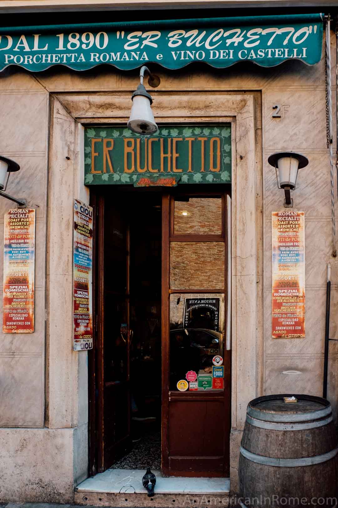 doorway to small porchetta shop er buchetto in rome