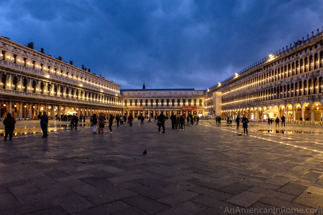 looking down st marks square with lights on at night