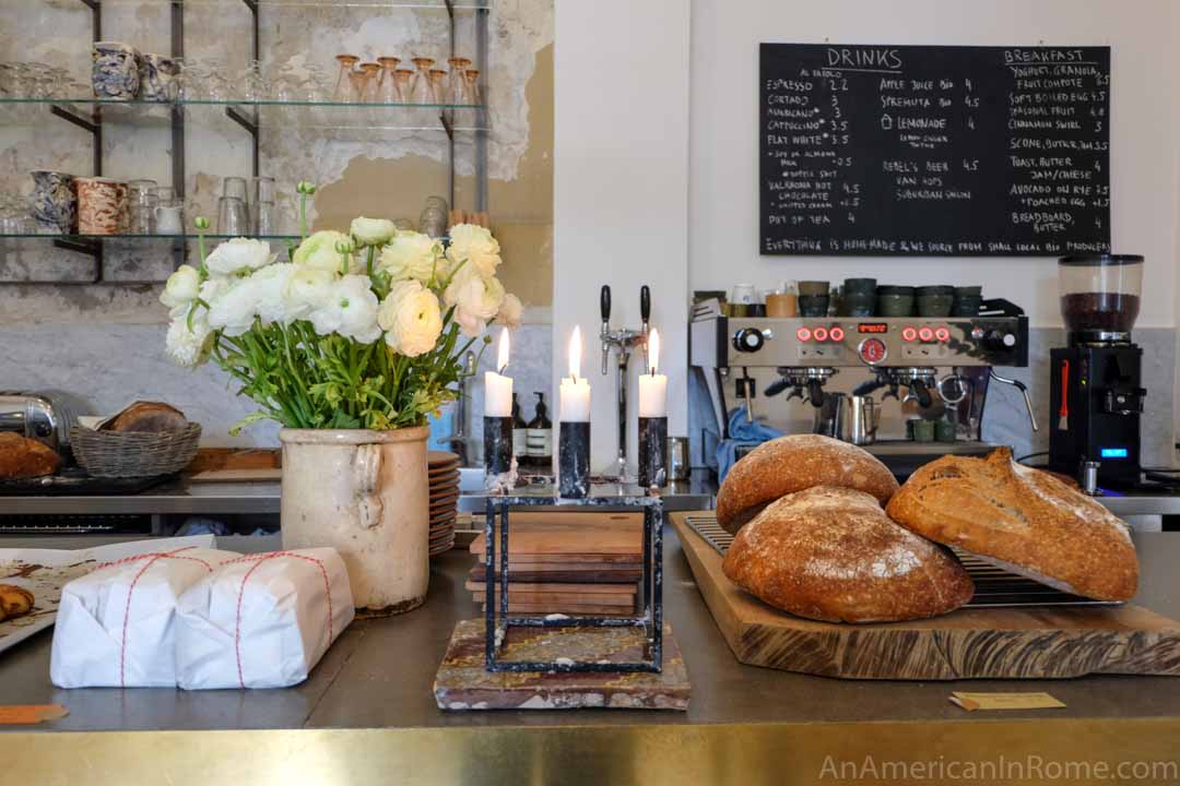 flowers, candles and bread at Marigold Roma