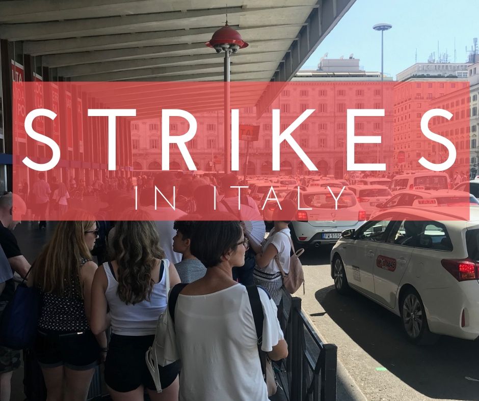 red text box strikes in italy over image of people waiting in line for a taxi