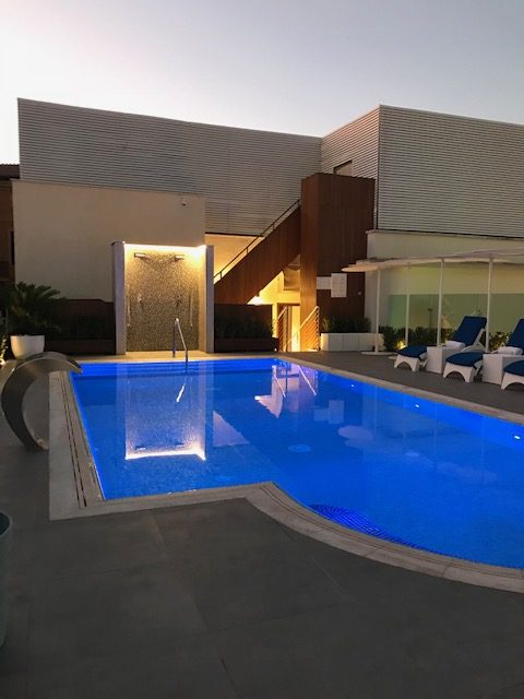 small rooftop pool at night