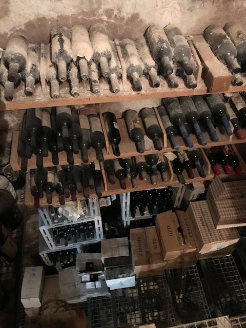 wine cellar at cibus covered in dust