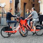 two people try bike rental rome