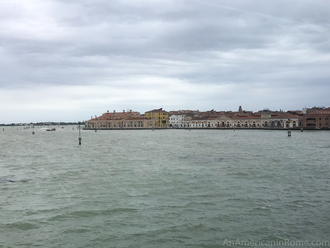 view of Venice across the water from train